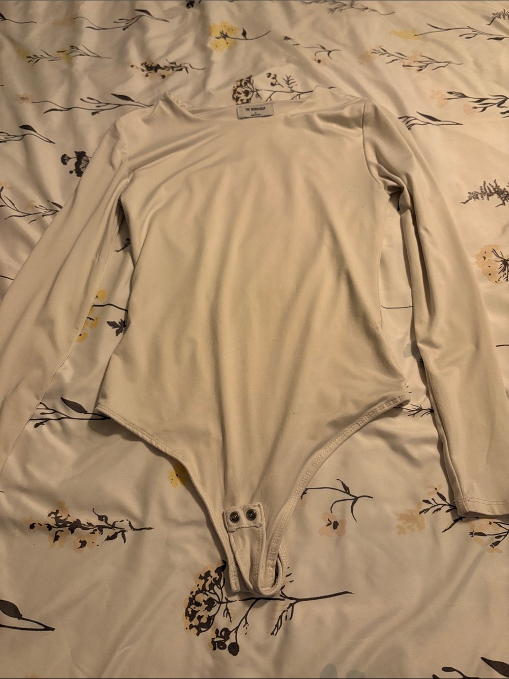 Francesca's Collections Cream Long-Sleeve Baby One-Piece Bodysuit